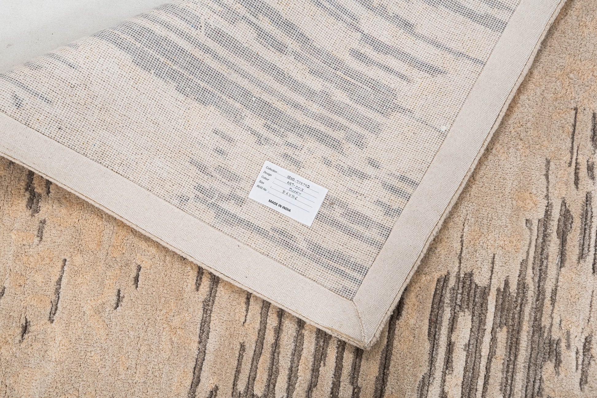 Ivory handmade wool and silk rug