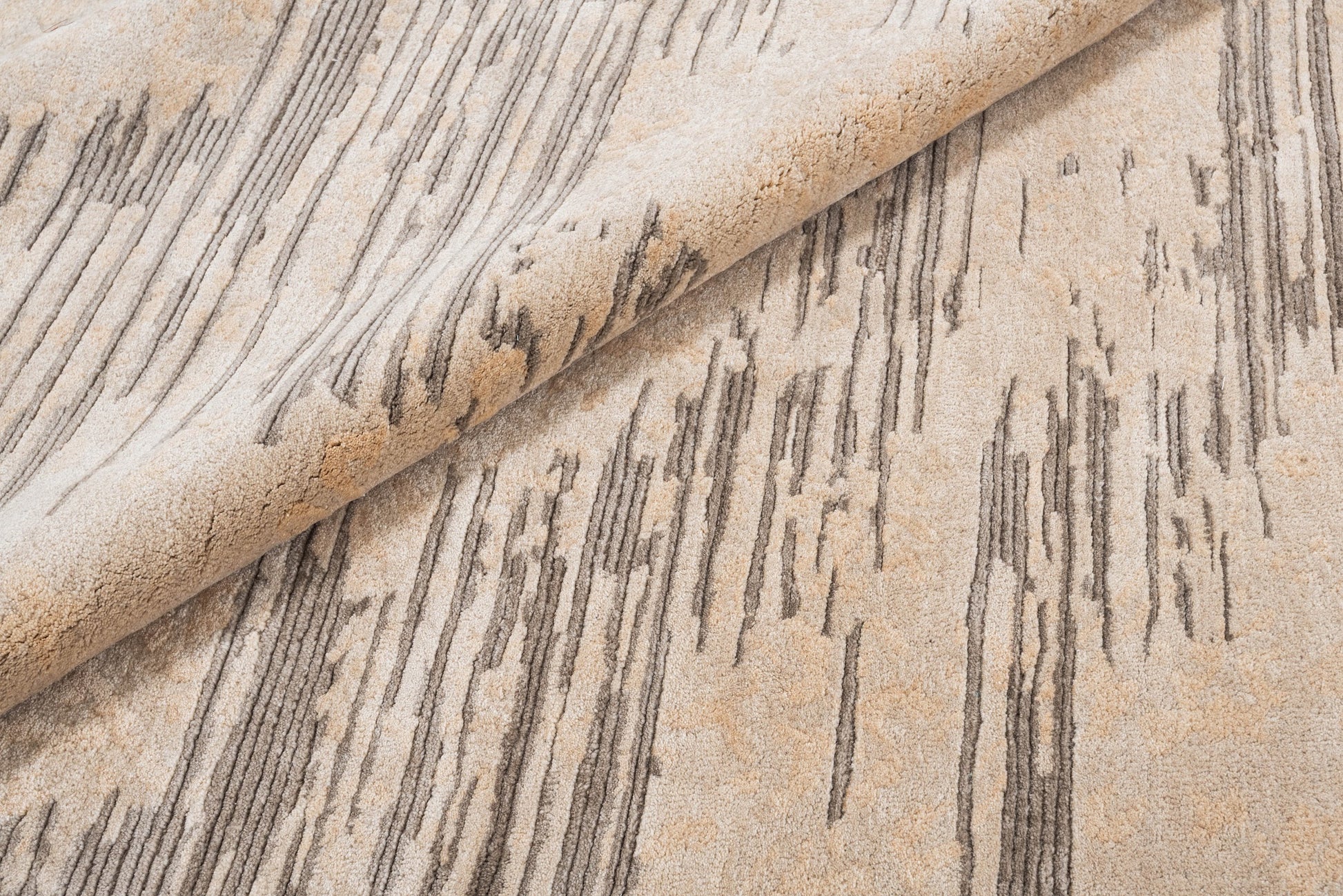Ivory handmade wool and silk rug