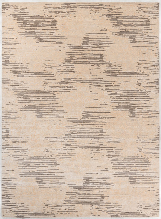Ivory handmade wool and silk rug in ivory, beige and taupe
